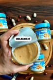 کره بادام زمینی راستـی کرانچی اصل 340 گرمی رنگ آبی هندی با تکههای بادام زمینی